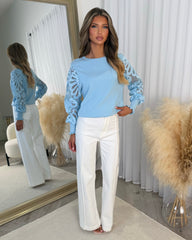 Charlotte Round Neck Jumper with Flower Arm Design - Baby Blue